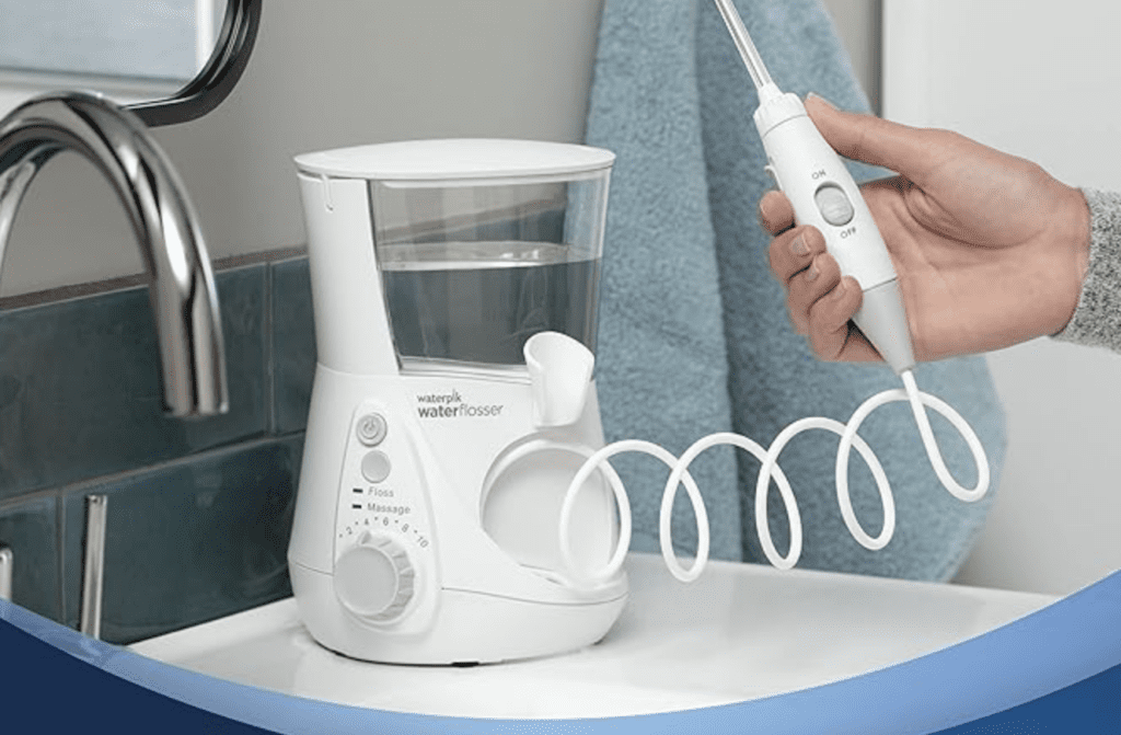 person holding a water pik